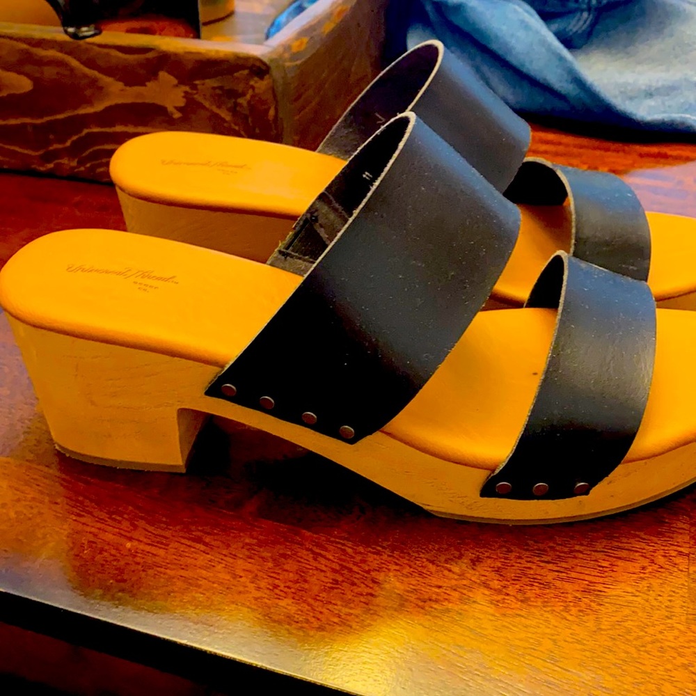 Simple black heeled sandals. Worn once